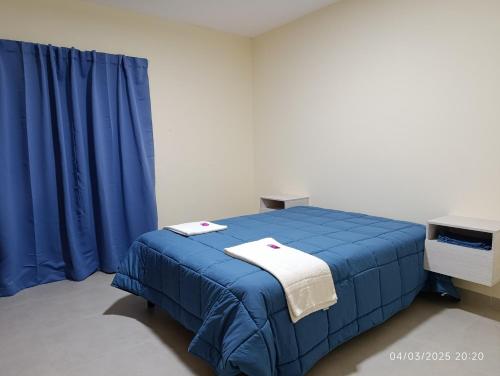 En eller flere senge i et værelse på Verde Mar