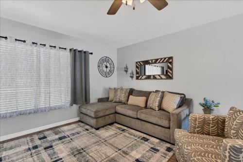 a living room with a couch and a chair at DBD1014 in Port Charlotte