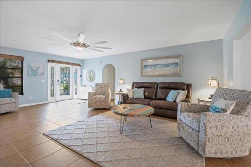 a living room with a couch and a table at BRC18614 in Port Charlotte