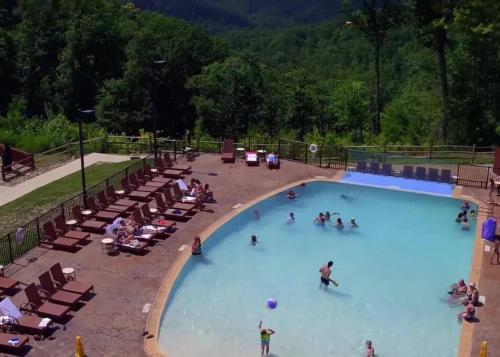 a large swimming pool with people playing in it at 1 BR Westgate Resort Sleeps 4 in Gatlinburg