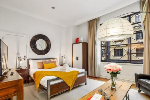 Katil atau katil-katil dalam bilik di Chic Studio In The Heritage