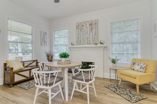 a dining room with a table and chairs at Pennsylvania Bungalow - Historic Home in Downtown Lakeland in Lakeland