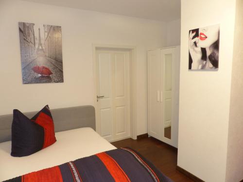 Cama o camas de una habitación en Aparthotel C'est la vie