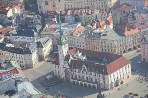an aerial view of a building with a clock tower at Apartman Relax Olomouc in Olomouc