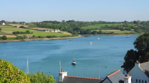 a view of a river with boats in it at Glas ha gwenn in Plougrescant