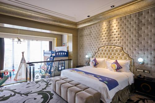 a bedroom with a large bed and a large window at Chateau Star River Shanghai Minhang in Shanghai