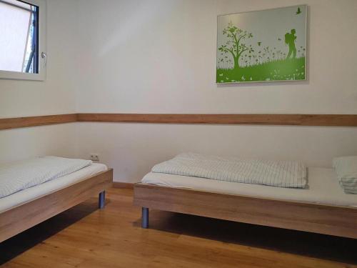 A bed or beds in a room at 4 star holiday home in Gaal im Murtal