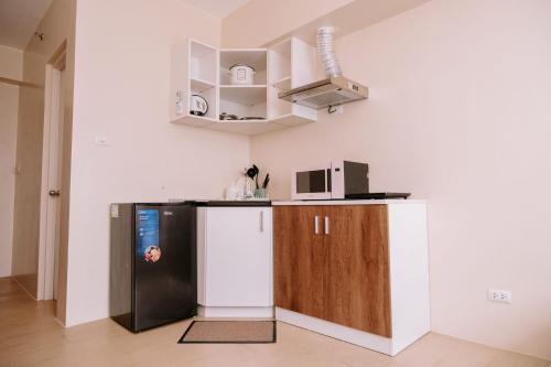 Kuchyň nebo kuchyňský kout v ubytování The Sleek Chic Hideaway