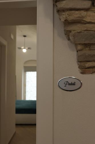 a door with a sign that reads paulitt on it at Il Viandante Bed & Breakfast in Roseto Valfortore