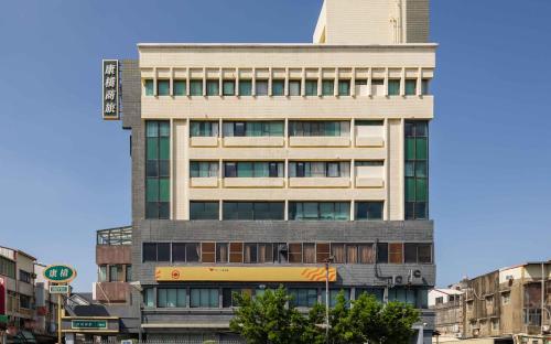 a tall building in the middle of a city at 康橋商旅 員林館 in Yuanlin