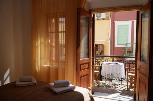 Postel nebo postele na pokoji v ubytování Antoni's Symi Home