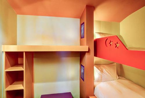 Ένα ή περισσότερα κρεβάτια σε δωμάτιο στο Hotel Novotel Sharm El-Sheikh