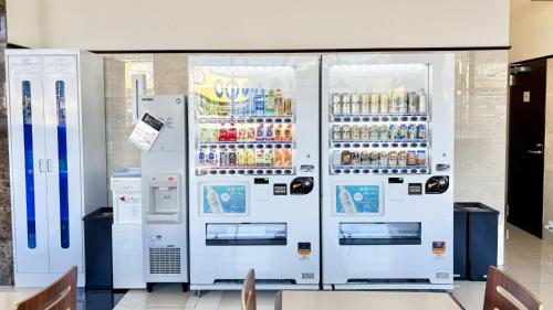 two white refrigerators in a store with drinks at Toyoko Inn Chiba Makuhari in Chiba