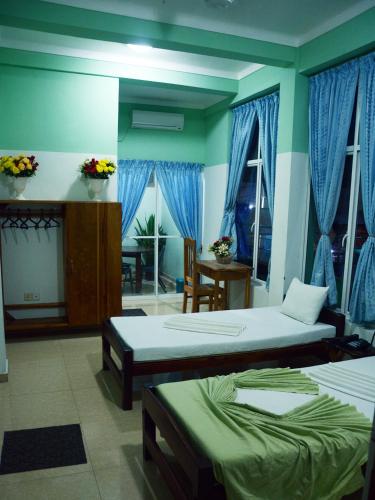 Ένα ή περισσότερα κρεβάτια σε δωμάτιο στο Kings Hotel Restaurant and Bar