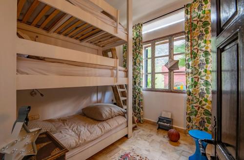 a bedroom with bunk beds in a house at Charming 5 bedroom in Marrakech