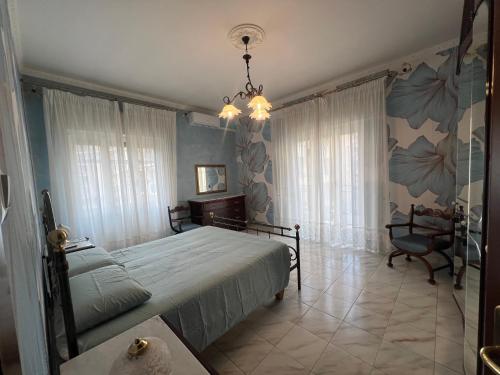 Postel nebo postele na pokoji v ubytování Sun&Sea Domus Apartment