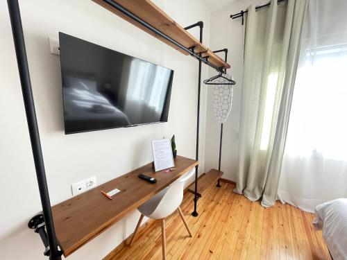TV o dispositivi per l'intrattenimento presso 19 Living
