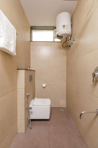 Bilik mandi di Olive Service Apartments - Koramangala