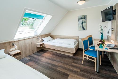 Posteľ alebo postele v izbe v ubytovaní Hotel-Restaurant Bauer-Keller
