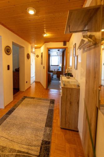 a kitchen with a sink and a counter in a room at Ferienwohnung Werner in Warmensteinach