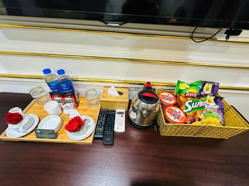 two baskets of food and snacks on a table at Aloha Hotel in Hanoi