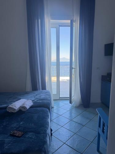 Ένα ή περισσότερα κρεβάτια σε δωμάτιο στο Hotel Belvedere e Tre Re