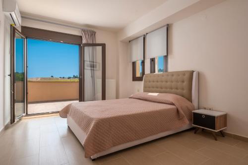 Ένα ή περισσότερα κρεβάτια σε δωμάτιο στο Orange Tree Villas