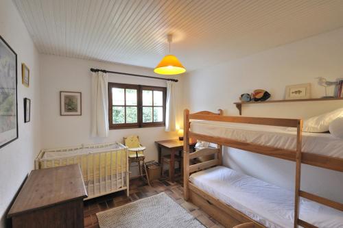 Postel nebo postele na pokoji v ubytování La Maison de Flo