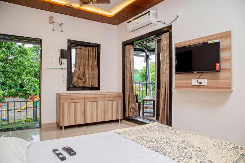 Postel nebo postele na pokoji v ubytování Riyansh Alibaug Villas and Resort