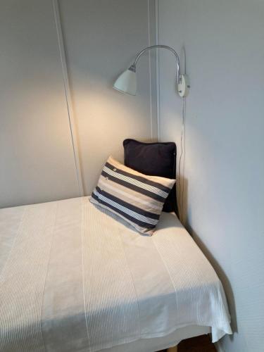 Postel nebo postele na pokoji v ubytování Slimmingegården 1019