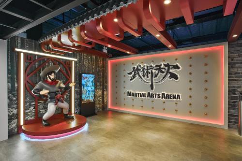 a room with a statue of a man with a weapon at Grand Lisboa Palace Macau in Macau