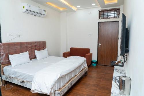 TV a/nebo společenská místnost v ubytování Hotel Shree Narayan