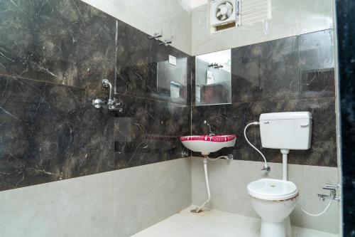 Koupelna v ubytování Hotel Shree Narayan