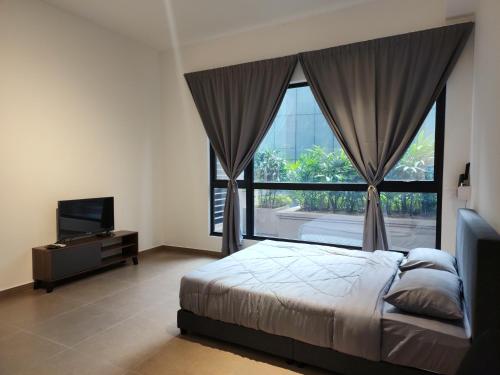 a bedroom with a bed and a large window at MOSSAZ Minimalist Studio 2 in Petaling Jaya