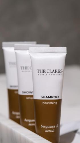 a group of three products sitting on a shelf at Clarks Inn Suites Agra Near Tajmahal in Agra