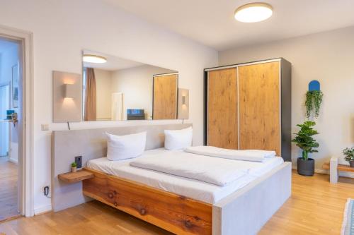 Ένα ή περισσότερα κρεβάτια σε δωμάτιο στο Design Apartments - "Im Holländerviertel" - Benkert 2