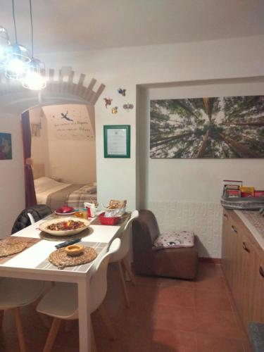 a kitchen with a table with food on it at Bnb Peter Pan in San Martino dʼAgri