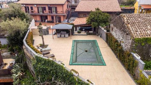 an overhead view of a swimming pool in a house at Villa Graziella in Tremestieri Etneo