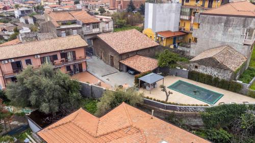 an aerial view of a house with a swimming pool at Villa Graziella in Tremestieri Etneo