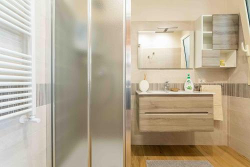 a bathroom with a shower and a sink at Villa Graziella in Tremestieri Etneo