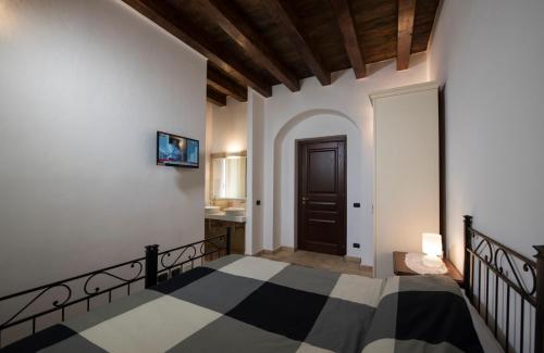 Postel nebo postele na pokoji v ubytování Agriturismo Raffo