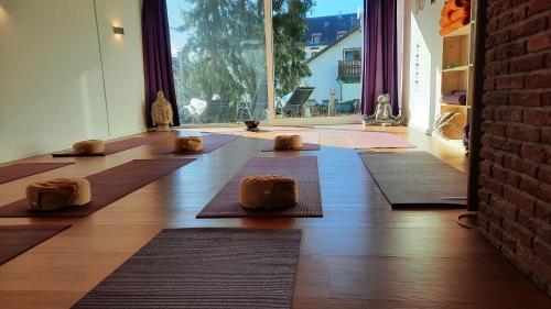 a room with yoga mats on the floor at Naturkost-Hotel Harz in Bad Grund