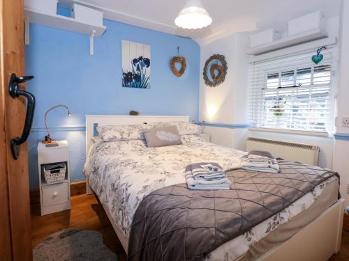 Ένα ή περισσότερα κρεβάτια σε δωμάτιο στο Llety