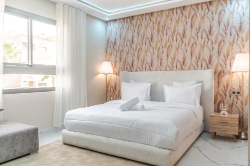 Cama o camas de una habitación en Hotel Rias Dakhla