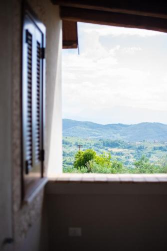 a window with a view of a mountain view at Casa Ciclope in Arpino