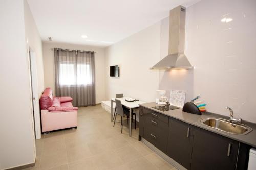 Khu vực ghế ngồi tại Apartamentos Turísticos La Boutique del Mar