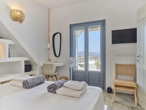 Ένα ή περισσότερα κρεβάτια σε δωμάτιο στο Villa Dalida