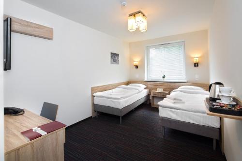 Automobil Hotelにあるベッド