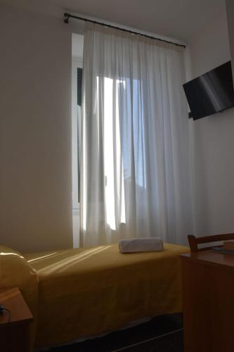 Hotel Le Palmeにあるテレビまたはエンターテインメントセンター