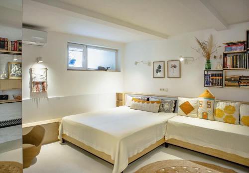 Кровать или кровати в номере Villa Mare Boutique Guesthouse by Flat Mаnаger